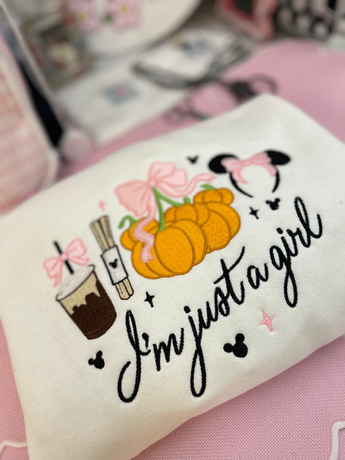 I’m Just a Girl Embroidered Pumpkin Park Sweatshirt