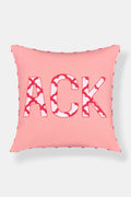 The Roller Rabbit ACK Applique Decorative Pillow features large, bold red and white patterned letters on a pink square cover with subtle red edging, bringing Vineyard-inspired charm to your decor.