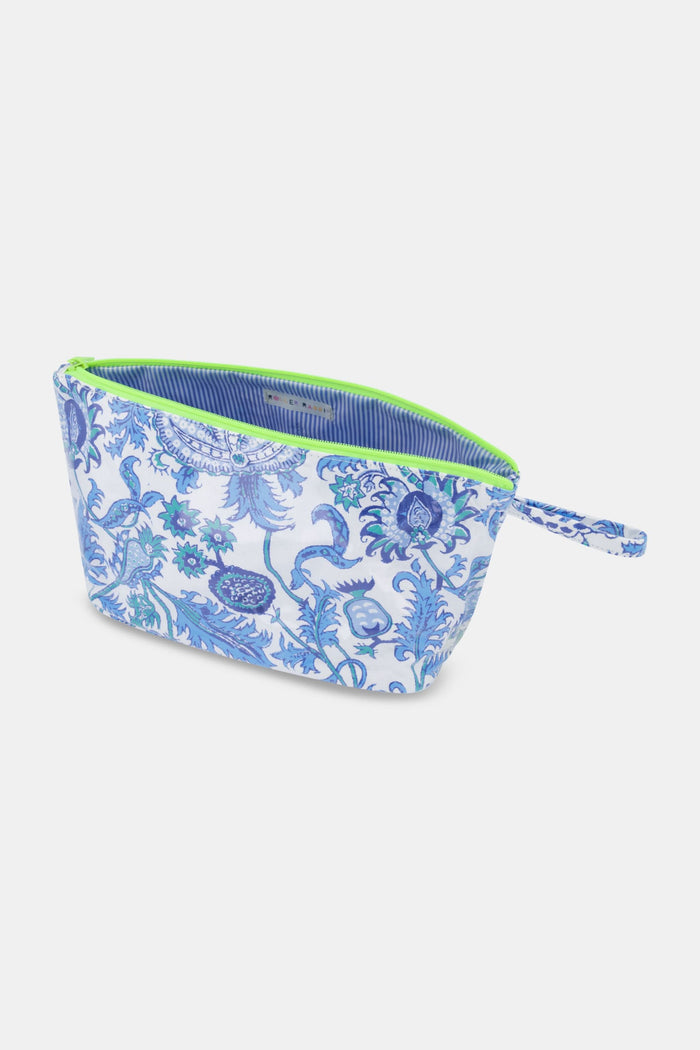 The Amanda Toiletry Case by Roller Rabbit is a rectangular, water-resistant pouch with a blue and purple floral pattern, green zipper, and matching side handle—ideal for travel essentials against a white background.