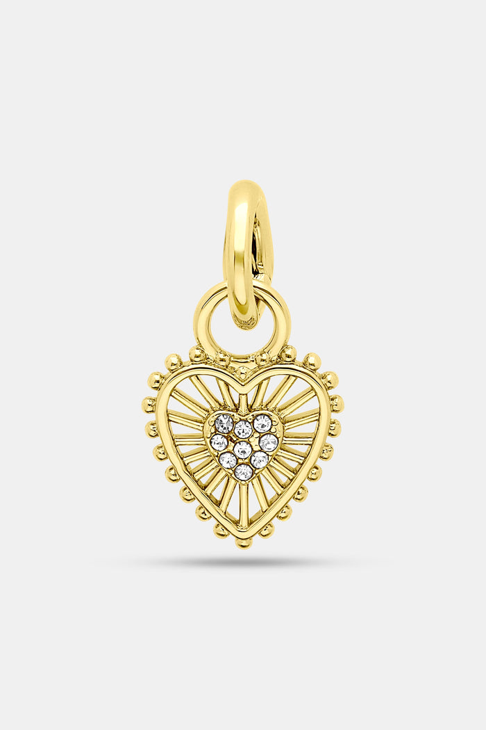 The Roller Rabbit Beaded Heart Charm features imitation gold with a textured border, a cluster of sparkling clear stones at the center, and a gold loop for easy hanging.