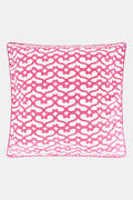 The Big Cata Decorative Pillow by Roller Rabbit features a white background with a bold pink geometric chain-link pattern. Made from 100 cotton with piped edges, it adds vibrant, modern style to any space.