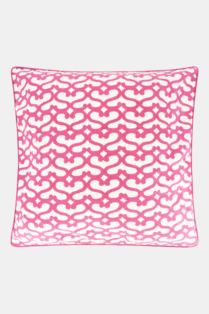The Big Cata Decorative Pillow by Roller Rabbit features a white background with a bold pink geometric chain-link pattern. Made from 100 cotton with piped edges, it adds vibrant, modern style to any space.