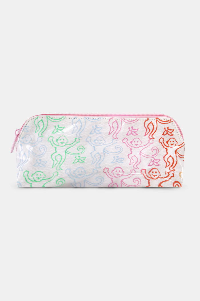 The Disco Monkey Makeup Bag by Roller Rabbit is a white cotton canvas pouch with a water-resistant finish, featuring a playful pattern of green, blue, pink, and red smiling monkeys with curly tails.