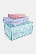 The Roller Rabbit Gift Wrap set features three decorative rectangular boxes—pink small, blue medium, and turquoise large—with intricate botanical designs, making a stylish, varied-size gift box set.