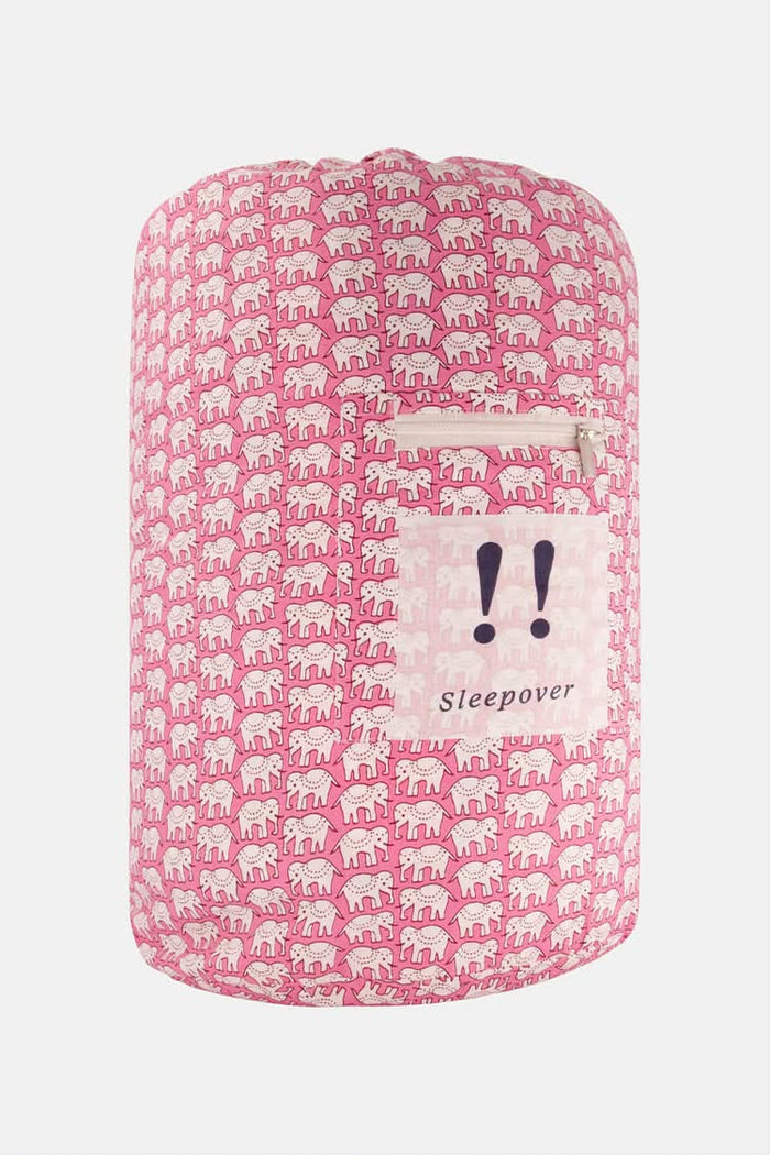 The Roller Rabbit Hathi Sleepover Bag is a pink and white kids’ sleeping bag with an elephant print, a front zipper pocket, and a purple “!! Sleepover” patch.
