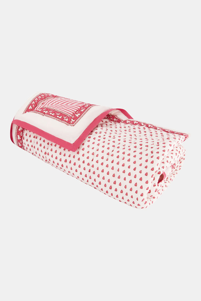 The Roller Rabbit Hearts Baby Quilt features a white cotton background with small red hearts print and a red and white border adorned with geometric and floral designs.