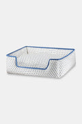 The Roller Rabbit Hearts Dog Bed features a plush rectangular design with blue trim, a lowered front edge, and an all-over blue heart pattern. This machine washable dog bed combines comfort and style for your pet.