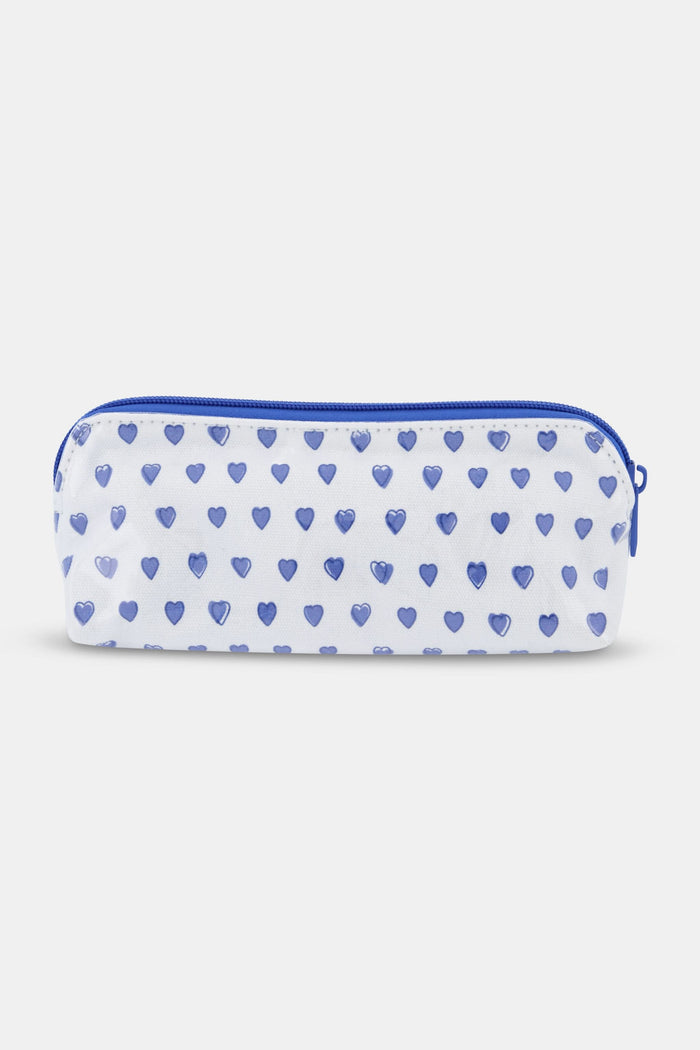 The Roller Rabbit Hearts Makeup Bag is a white water-resistant canvas pouch with a blue zipper and an all-over blue heart print.
