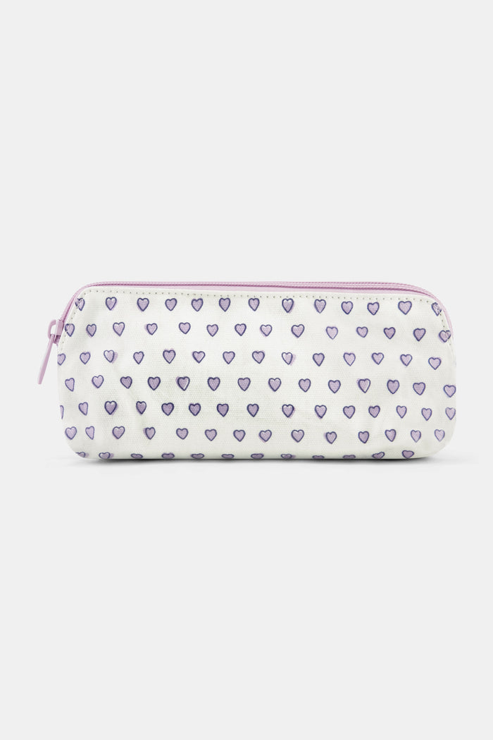 The Roller Rabbit Hearts Makeup Bag is a water-resistant canvas pouch with a white base, light purple zipper, and an allover print of small purple-outlined hearts.