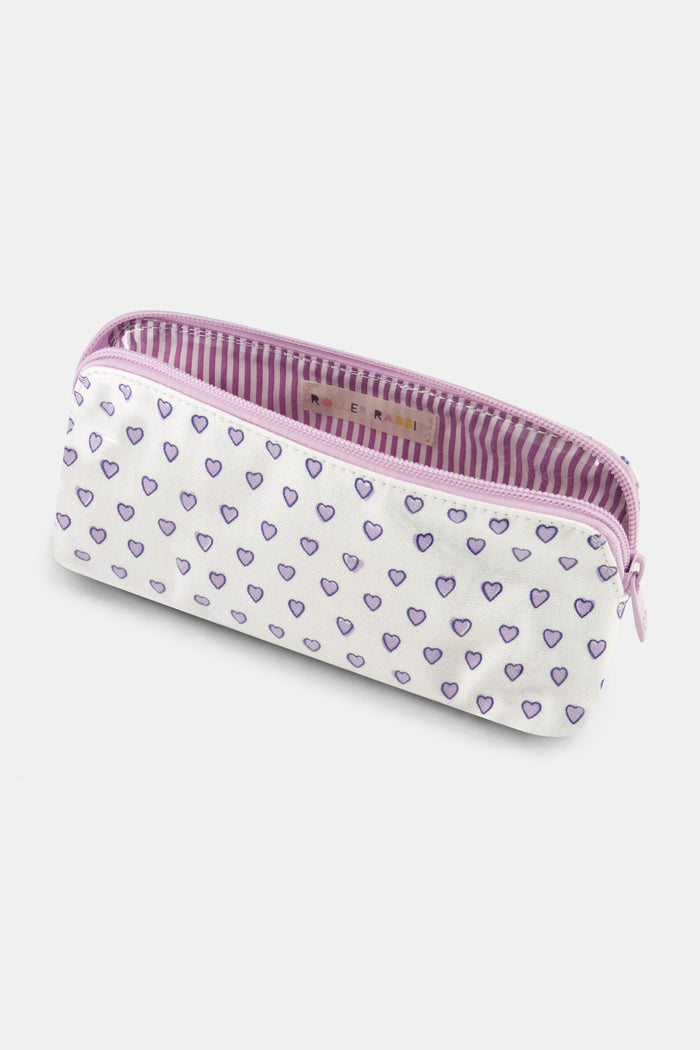 The Roller Rabbit Hearts Makeup Bag is a water-resistant canvas pouch with a white base, light purple zipper, and an allover print of small purple-outlined hearts.