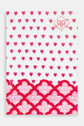 The Hearts Notebook by Roller Rabbit features a white cover with small red and pink hearts, a scalloped red and white floral border at the bottom, and a “RR” logo—perfect for pairing with your favorite lined notebook.