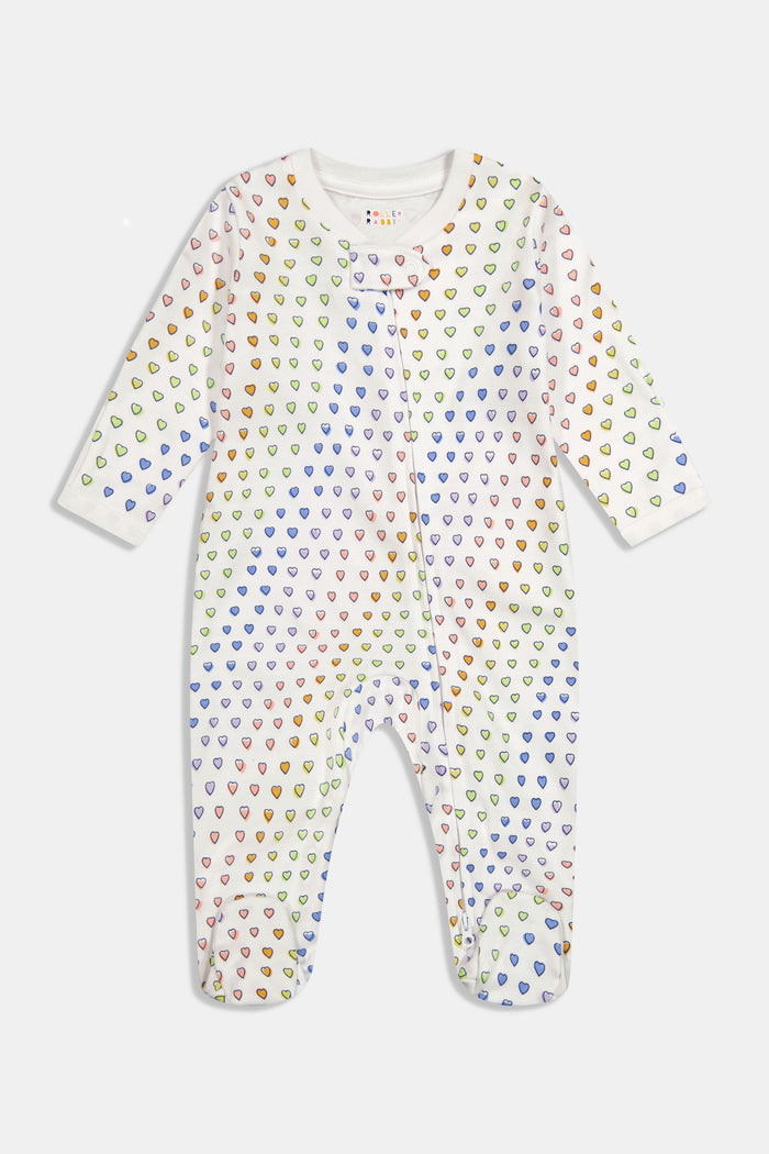 The Roller Rabbit Infant Disco Hearts Zipper Footie is a white, long-sleeve sleepsuit made from soft 100 cotton, featuring multicolored hearts and covered feet, shown laid flat on a plain background.