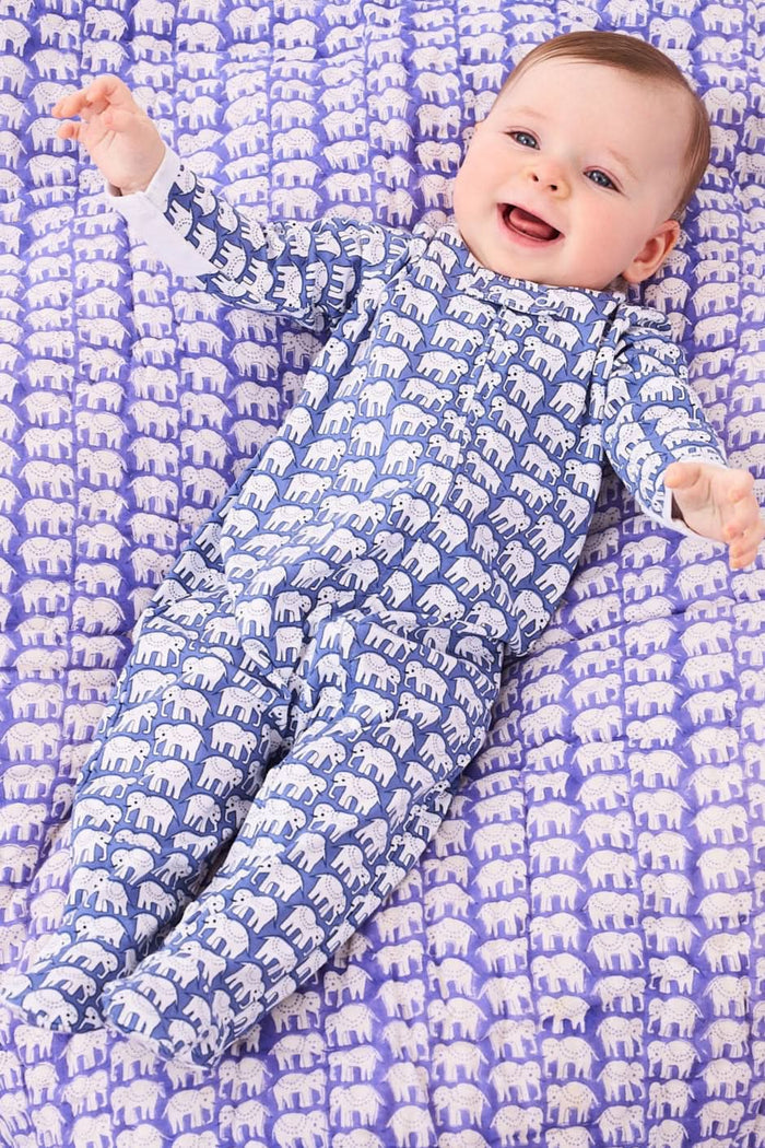 The Roller Rabbit Infant Hathi Zipper Footie features a Hathi the Elephant print on blue with white trim, long sleeves, and cozy footed design.