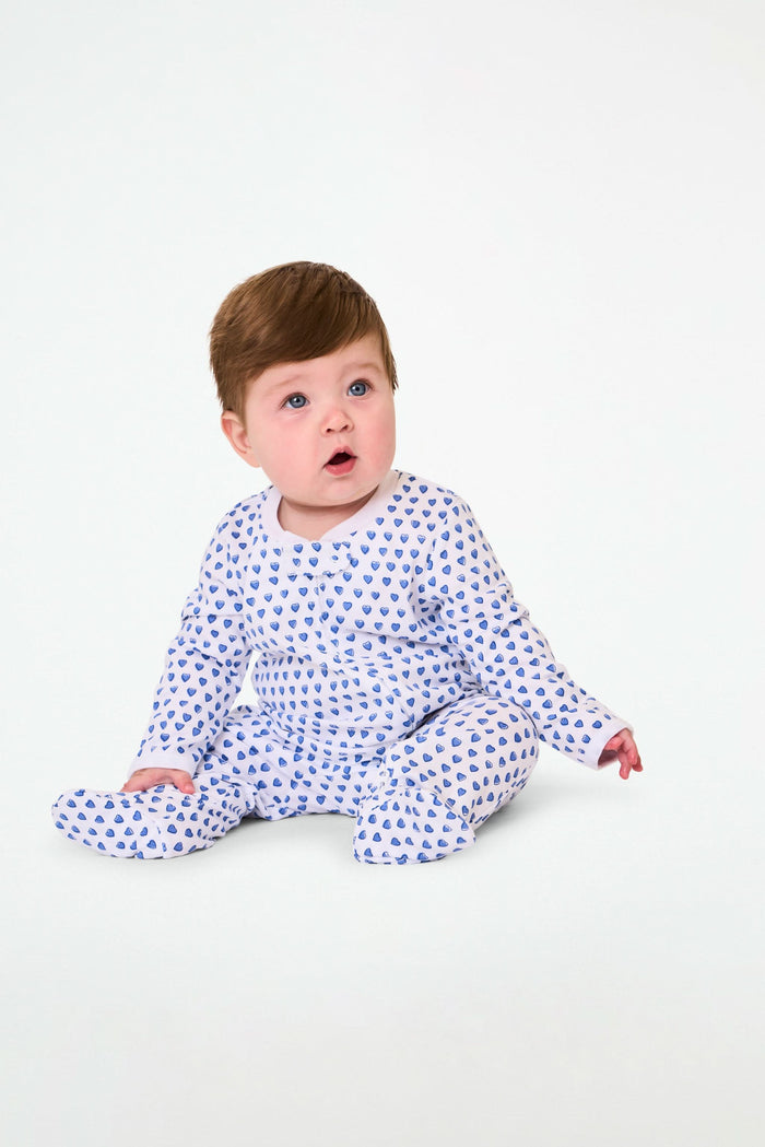 The Roller Rabbit Infant Hearts Zipper Footie is a white 100 cotton baby pajama with long sleeves, covered feet, and an all-over small blue hearts print, featuring a front zipper for easy dressing.