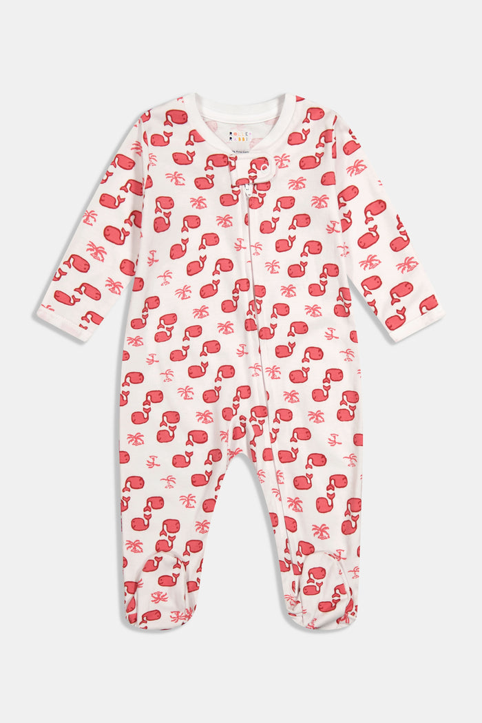 The Roller Rabbit Infant Moby Zipper Footie is a white, long-sleeve, 100 Pima cotton onesie with covered feet. It features a red Santa Claus and palm tree pattern and a front zipper from neck to foot.
