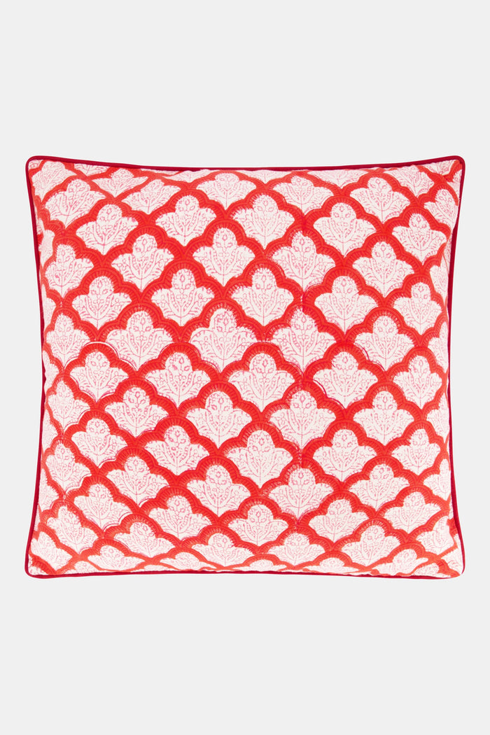 The Jemina Decorative Pillow by Roller Rabbit features a red and white scallop pattern with floral accents, red piping, and is crafted from 100 cotton on a plain white background.