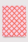 The Jemina Duvet Cover by Roller Rabbit features a red and white heart-patterned print, paired with matching pillow shams and crisp white sheets. Neatly arranged pillows and an ornate white headboard complete the airy, inviting bedding look.