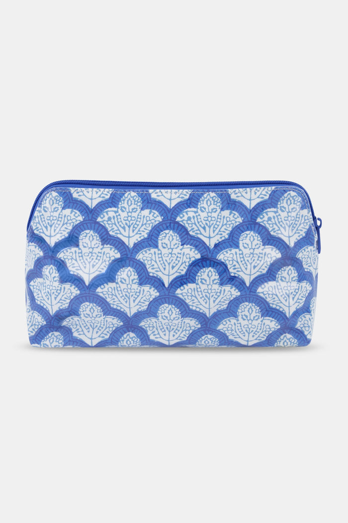 The Jemina Makeup Bag by Roller Rabbit is a rectangular cotton canvas bag with a blue zipper and a repeating blue and white floral pattern on a white background.