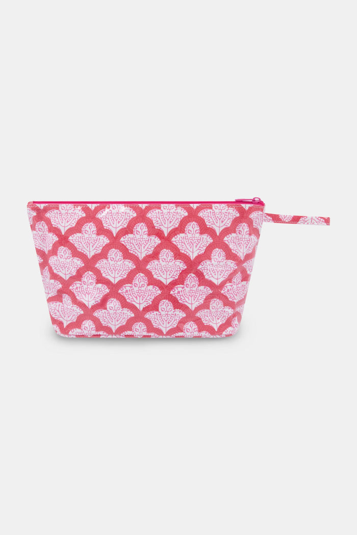The Jemina Toiletry Case by Roller Rabbit features a pink zippered design with a white floral pattern and matching pink strap, shown against a plain white background. Perfect for organizing your travel essentials.