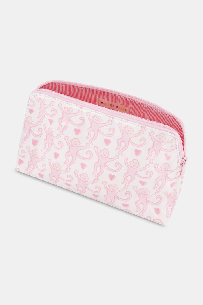 The Lovely Monkey Makeup Bag by Roller Rabbit is a rectangular white cotton canvas pouch with a pink zipper, featuring a repeating pattern of pink cartoon monkeys and small pink hearts.