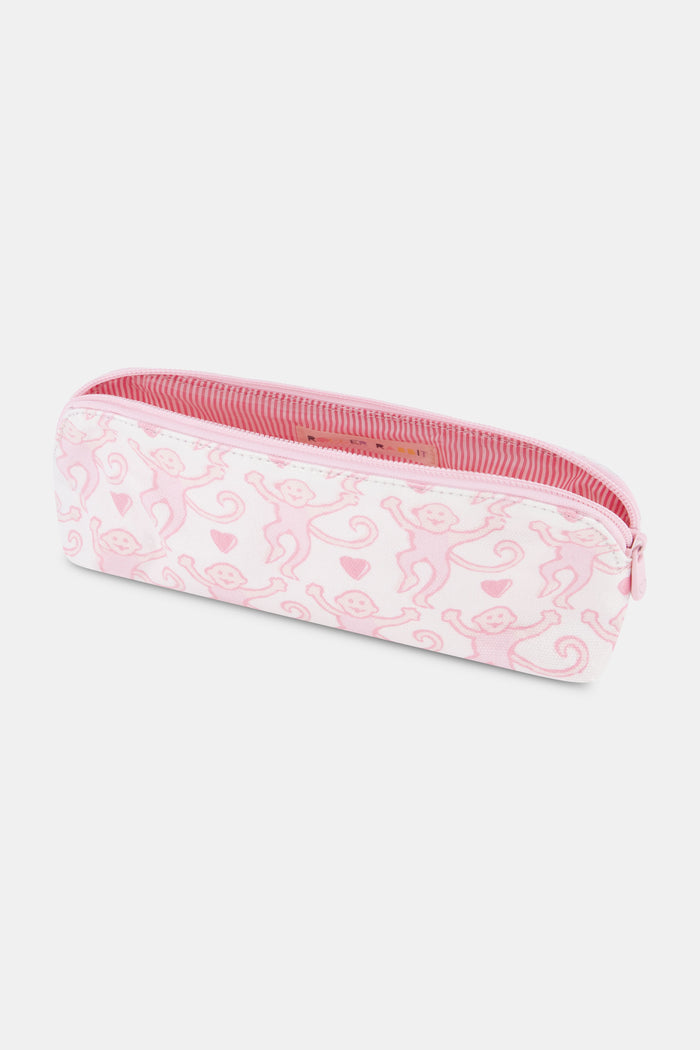 The Lovely Monkey Makeup Bag by Roller Rabbit is a rectangular white cotton canvas pouch with a pink zipper, featuring a repeating pattern of pink cartoon monkeys and small pink hearts.