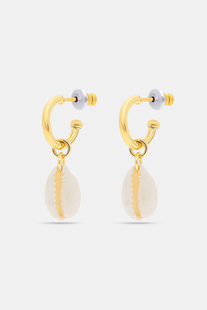 Roller Rabbit’s Marina Earrings Set includes two gold hoop pairs: one with white cowrie shell charms, the other with gold fish-shaped charms. Part of our oceanic jewelry collection, both come with clear earring backs.