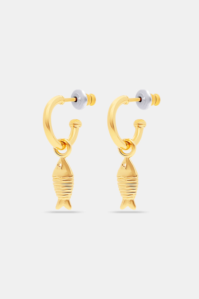 Roller Rabbit’s Marina Earrings Set includes two gold hoop pairs: one with white cowrie shell charms, the other with gold fish-shaped charms. Part of our oceanic jewelry collection, both come with clear earring backs.
