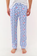 A person models the lower half of the Roller Rabbit Mens Sammy The Sheep Simon Pant—a relaxed fit PJ pant featuring a blue and pink sheep print—while standing barefoot on a white background.