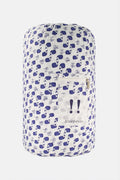 The Moby Sleepover Bag by Roller Rabbit is a large, white, cylindrical cotton bag with a blue whale pattern and a clear front pocket labeled "Sleepover!" It's soft and ideal for carrying bedding or sleepover essentials.