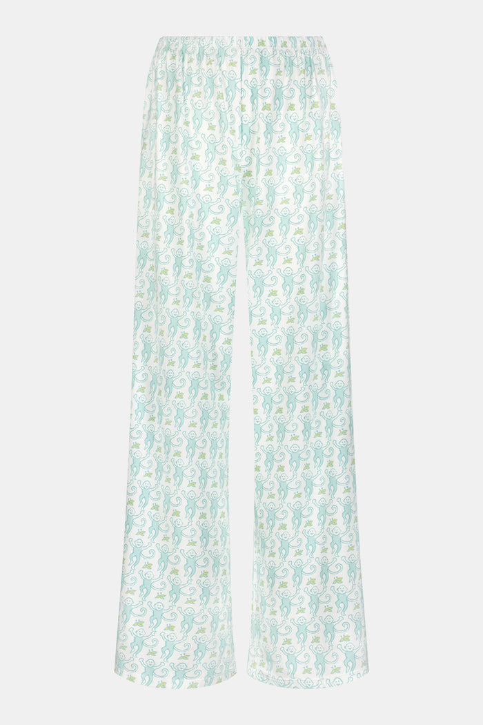 Wearing Roller Rabbit’s Monkey Monroe Pant in light blue and white heart-print cotton modal, the barefoot person stands against a white background, with only their lower torso and legs visible.