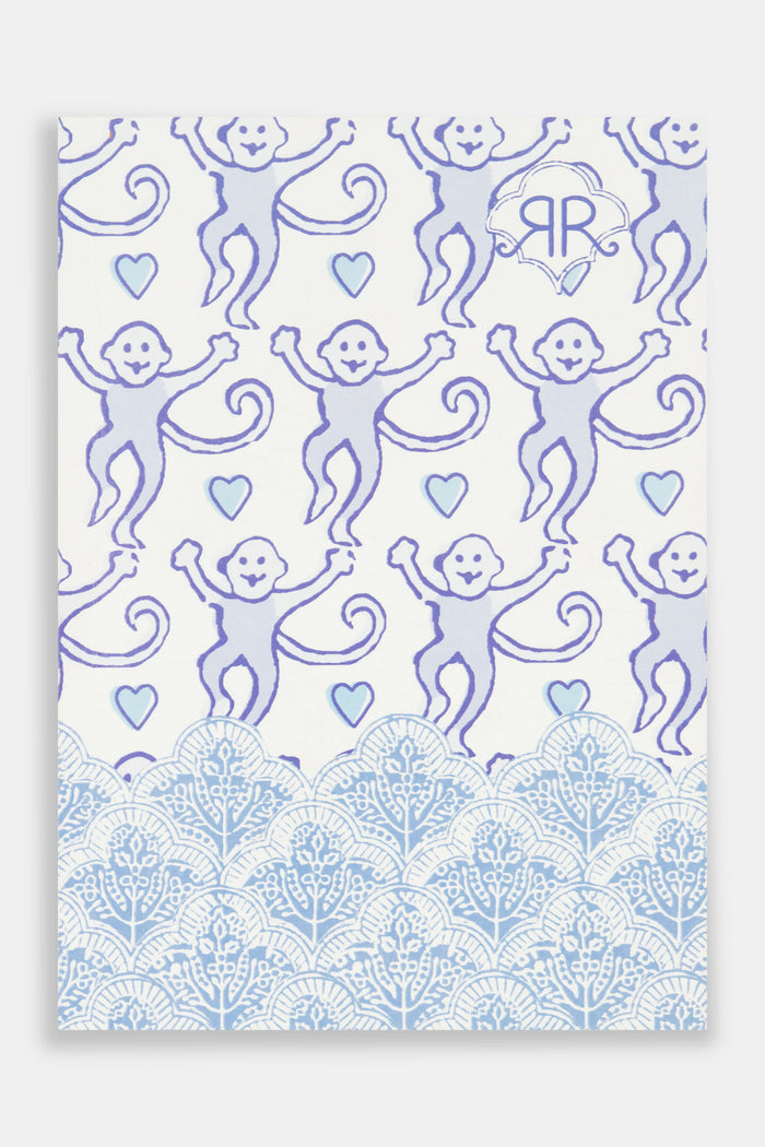 The Monkey Notebook by Roller Rabbit features playful purple monkeys and blue hearts on white, a blue lace-like border with stylized trees, and a monogram "RR" in the upper right corner—a perfect soft cover notebook.