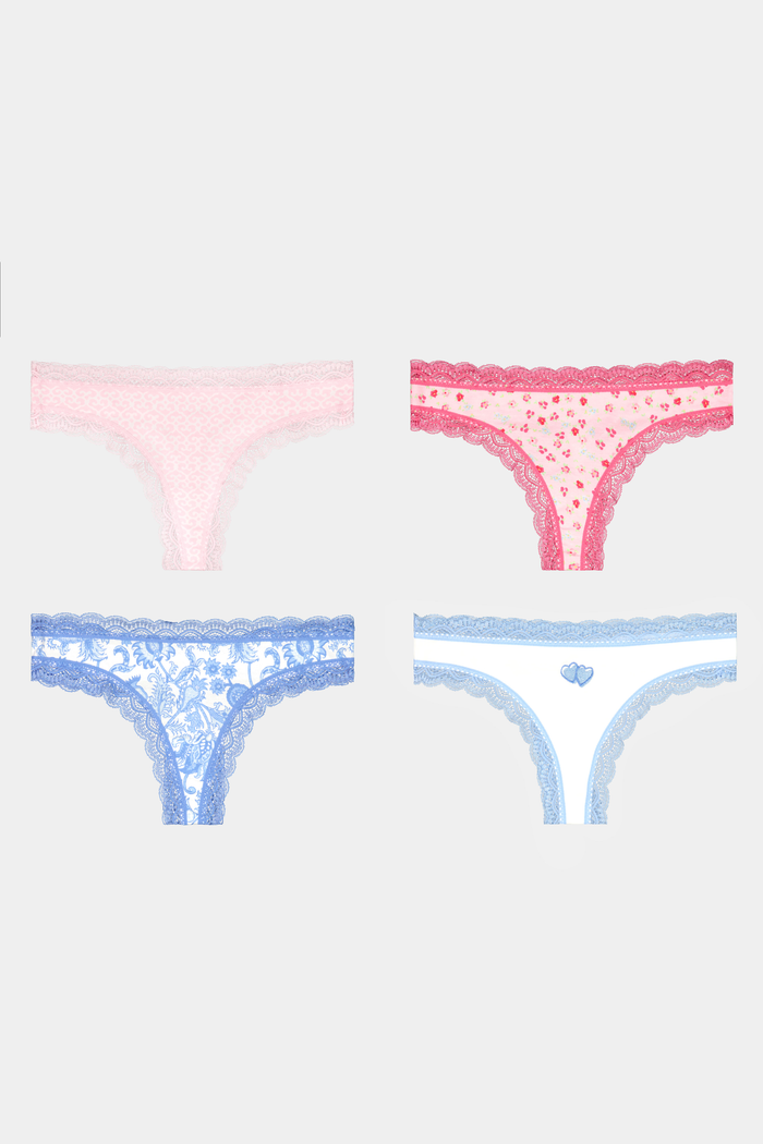 The Roller Rabbit Pastel Core Thong 4 Pack includes four soft thong underwear in light pink, pink with red trim, floral light blue, and white with blue trim and a heart detail for all-day comfort.