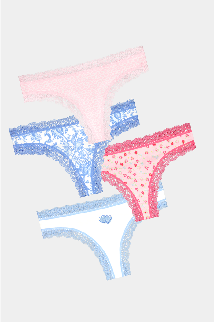The Roller Rabbit Pastel Core Thong 4 Pack includes four soft thong underwear in light pink, pink with red trim, floral light blue, and white with blue trim and a heart detail for all-day comfort.