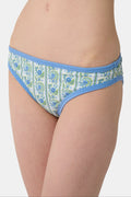 A person shown from the waist to upper thighs is wearing the Roller Rabbit Provencal Stripe Oceana Bikini Bottom featuring a blue and green floral design with light blue trim in a high-waisted bikini style.